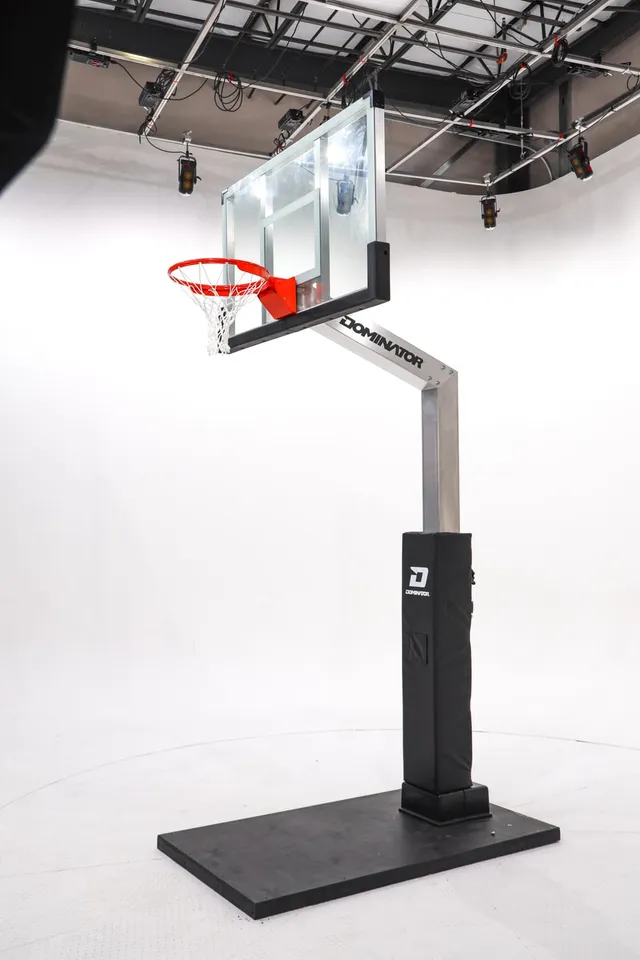 The 60 inch hoop photographed in a studio on a temporary weighted base plate, showing the telescoping joint part way up the pole.