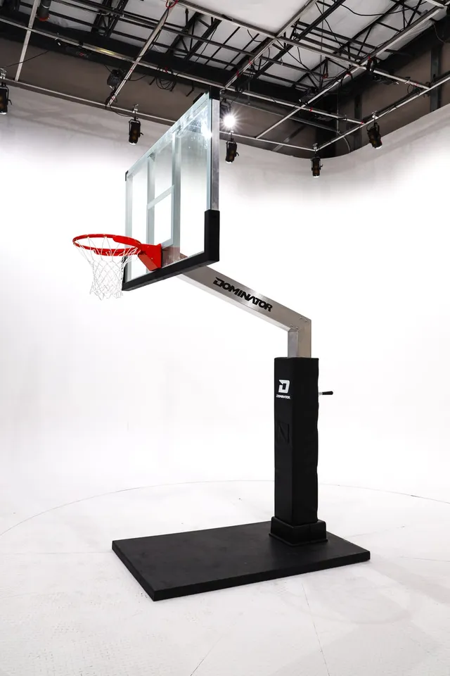 The 72 inch hoop photographed in a studio from the side, showing the four foot extension arm carrying the board clear of the pole.