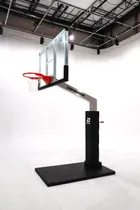The 72 inch hoop photographed in a studio from the side, showing the four foot extension arm carrying the board clear of the pole.