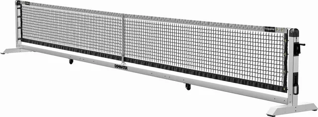 Render of the Dominator Pro Max portable pickleball net in brushed aluminum: a 271 inch frame on square 2.95 inch posts, with a lift handle at one end that raises the wheels off the court.