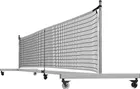 Dominator Standard portable pickleball net seen square on, a black net on a slim square aluminum frame standing on four small locking wheels.