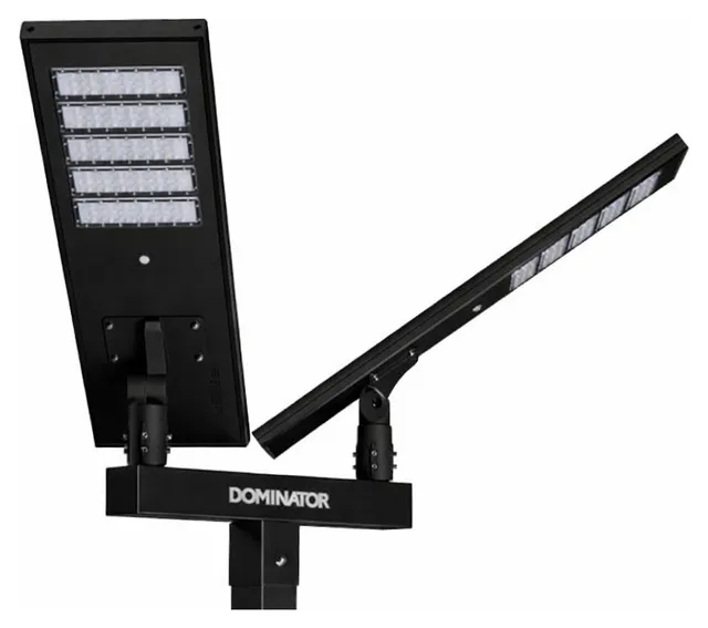 Two black solar fixtures on a black crossbar, the panel faces up and the Dominator name across the bar.